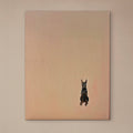 Commissioned oil portrait of a seated Doberman on a soft peach canvas